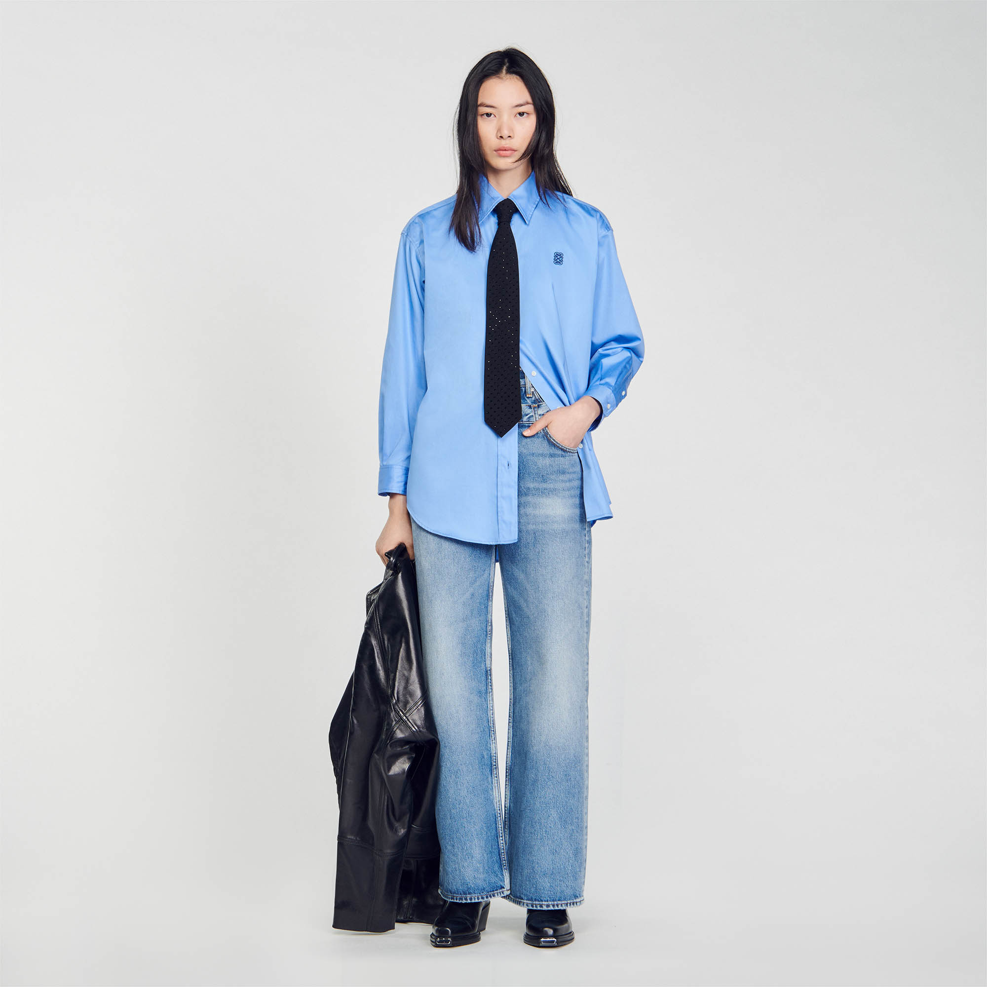 Sandro cotton Buttons: Oversized cotton shirt with long sleeves, button fastening and embellished with contrasting double S embroidery on the chest