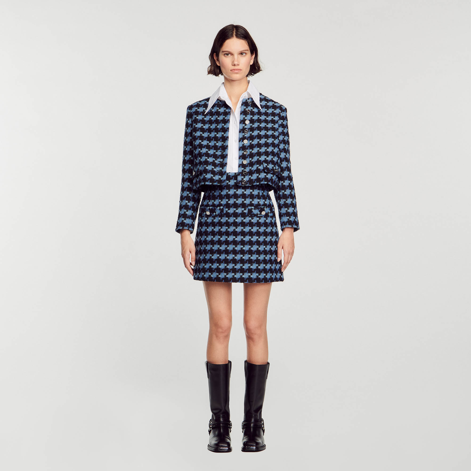 Sandro cotton Short tweed skirt with a houndstooth pattern and piped pockets with buttons on the waist Sandro Women's short tweed skirt Houndstooth pattern 2 piped pockets with buttons This skirt has a matching jacket This item's main material is at least 50% recycled