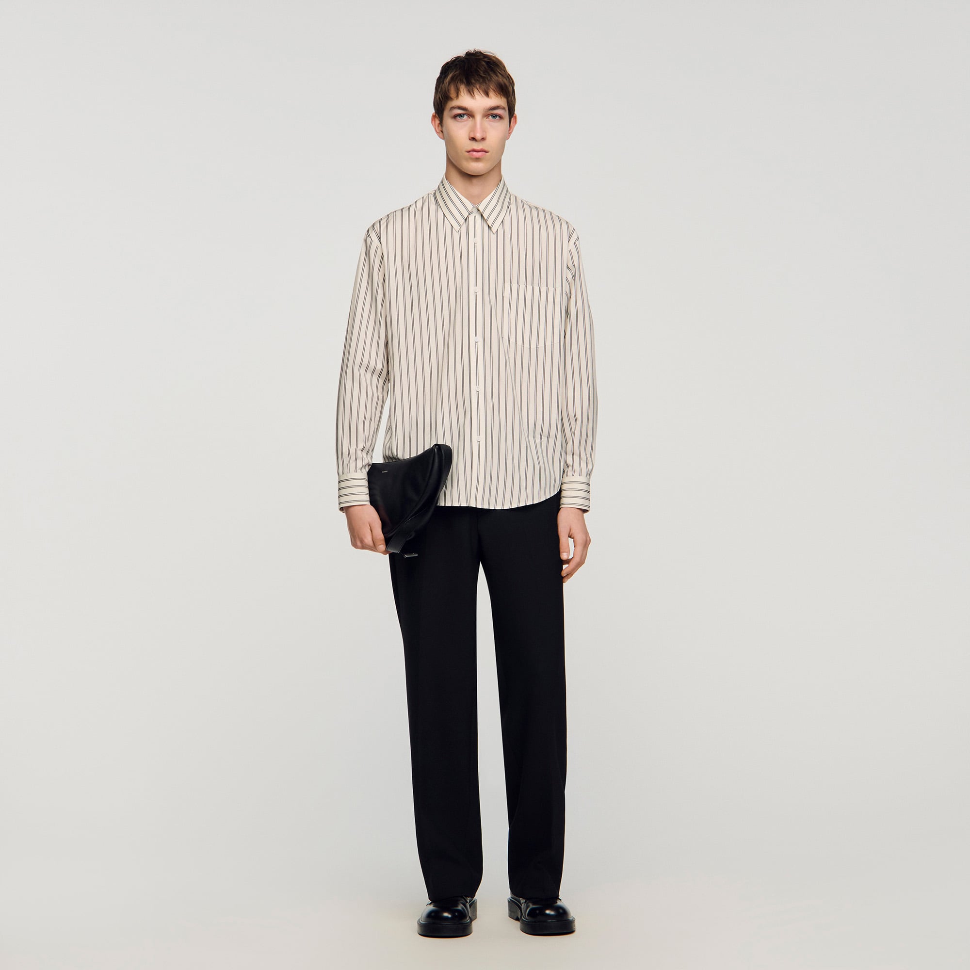 Sandro cotton Vertically striped shirt with a classic collar, flared cut, long sleeves and a front button fastening