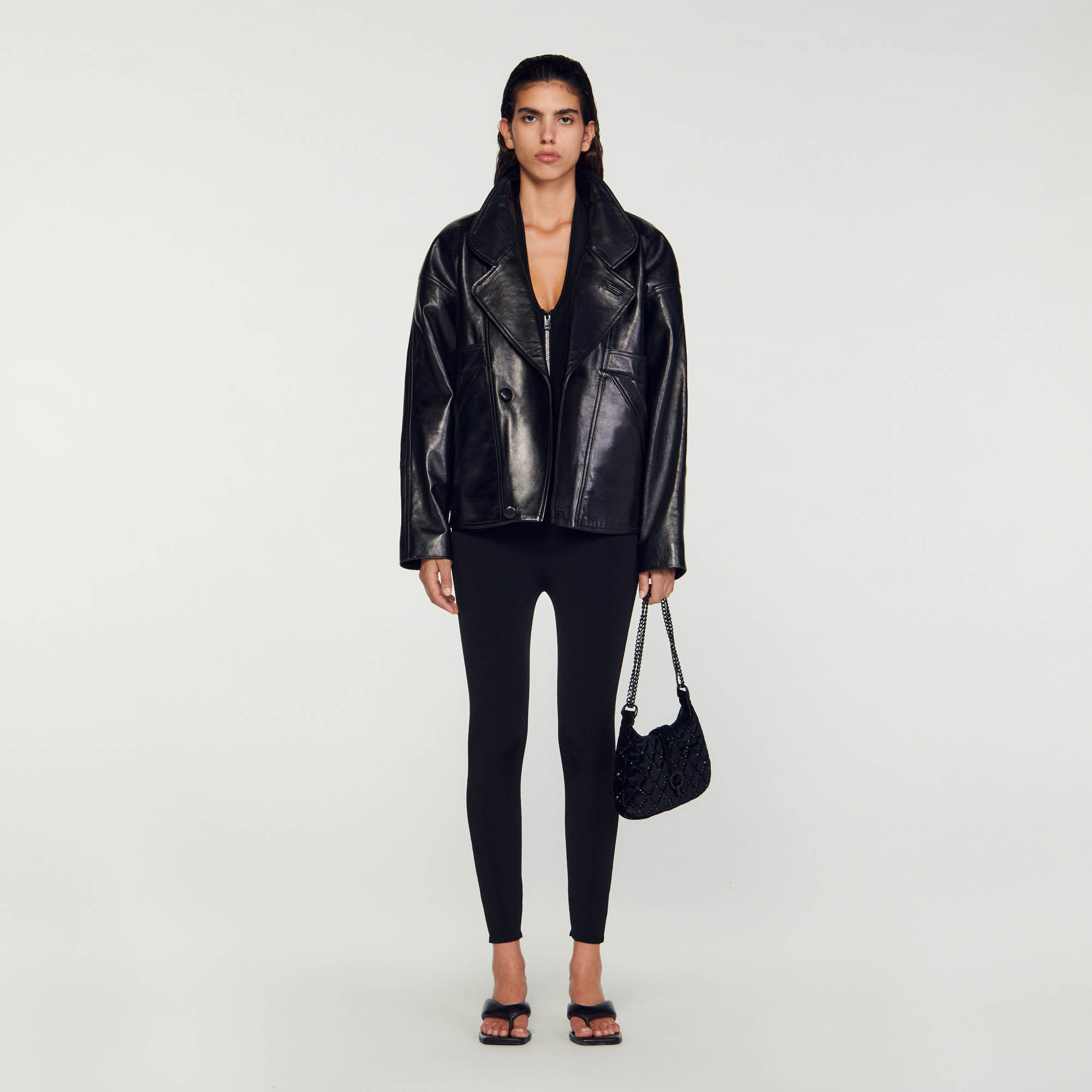 Sandro polyester Oversized leather jacket featuring a lapel collar with a suit jacket look, long sleeves, a double-breasted fastening and embellished with tailored details on the front