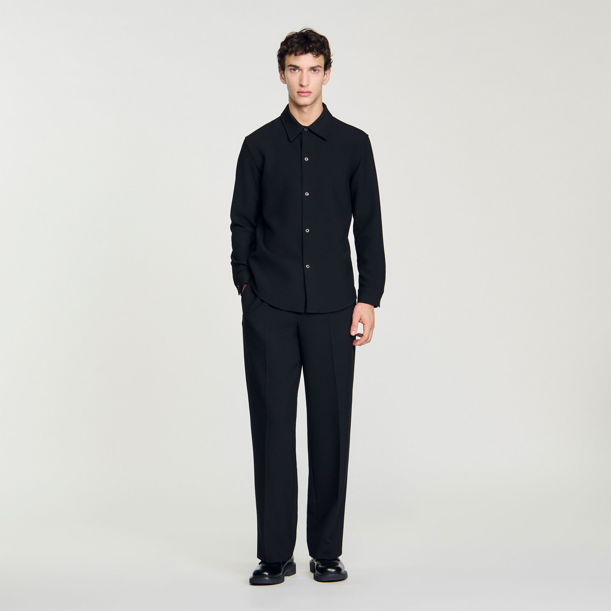 Sandro polyester Jersey buttoned shirt with long sleeves, a classic collar, and snap-fastened cuffs