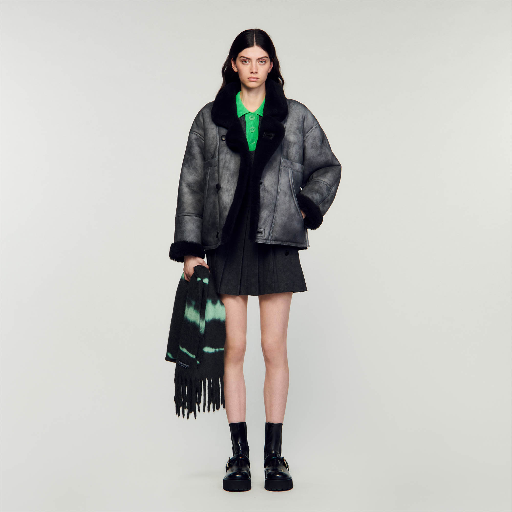 Sandro shearling Leather: Oversized coat in vintage-effect woolen shearling, with a lined interior and wide fur collar, long sleeves, a double breasted front that fastens with buttons and side pockets
