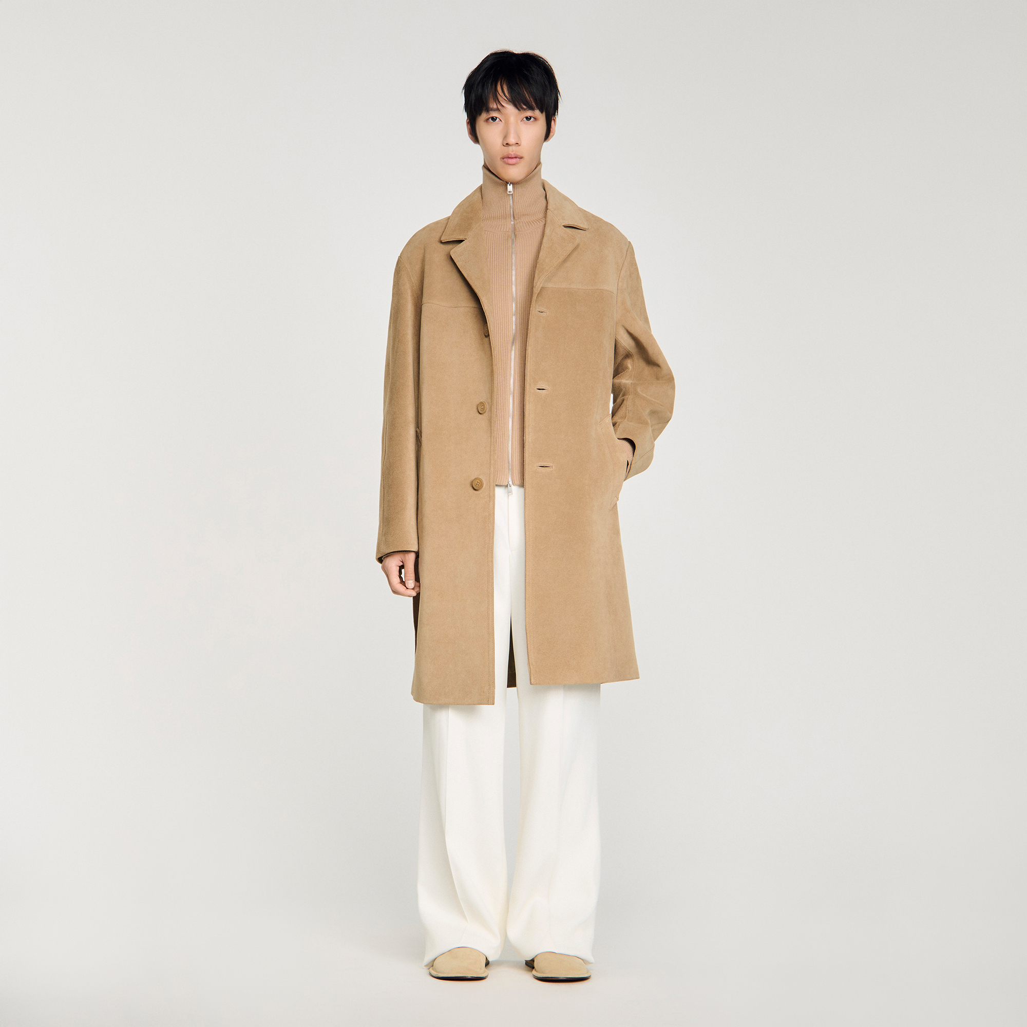 Sandro leather Mid-length suede trench coat featuring a waist belt, button fastening, long sleeves and welt pockets