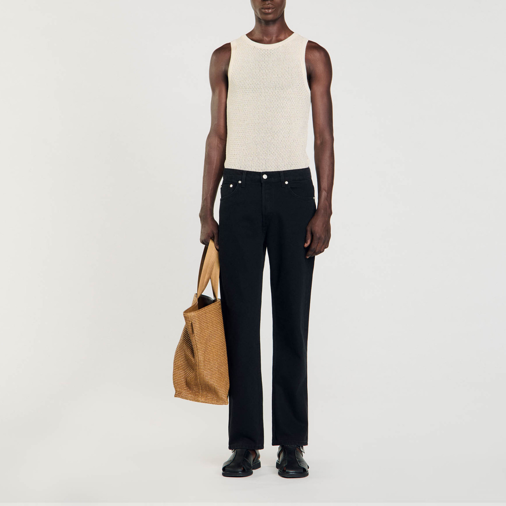Sandro cotton Regular-fit denim jeans with five pockets and a leather jacron on the back