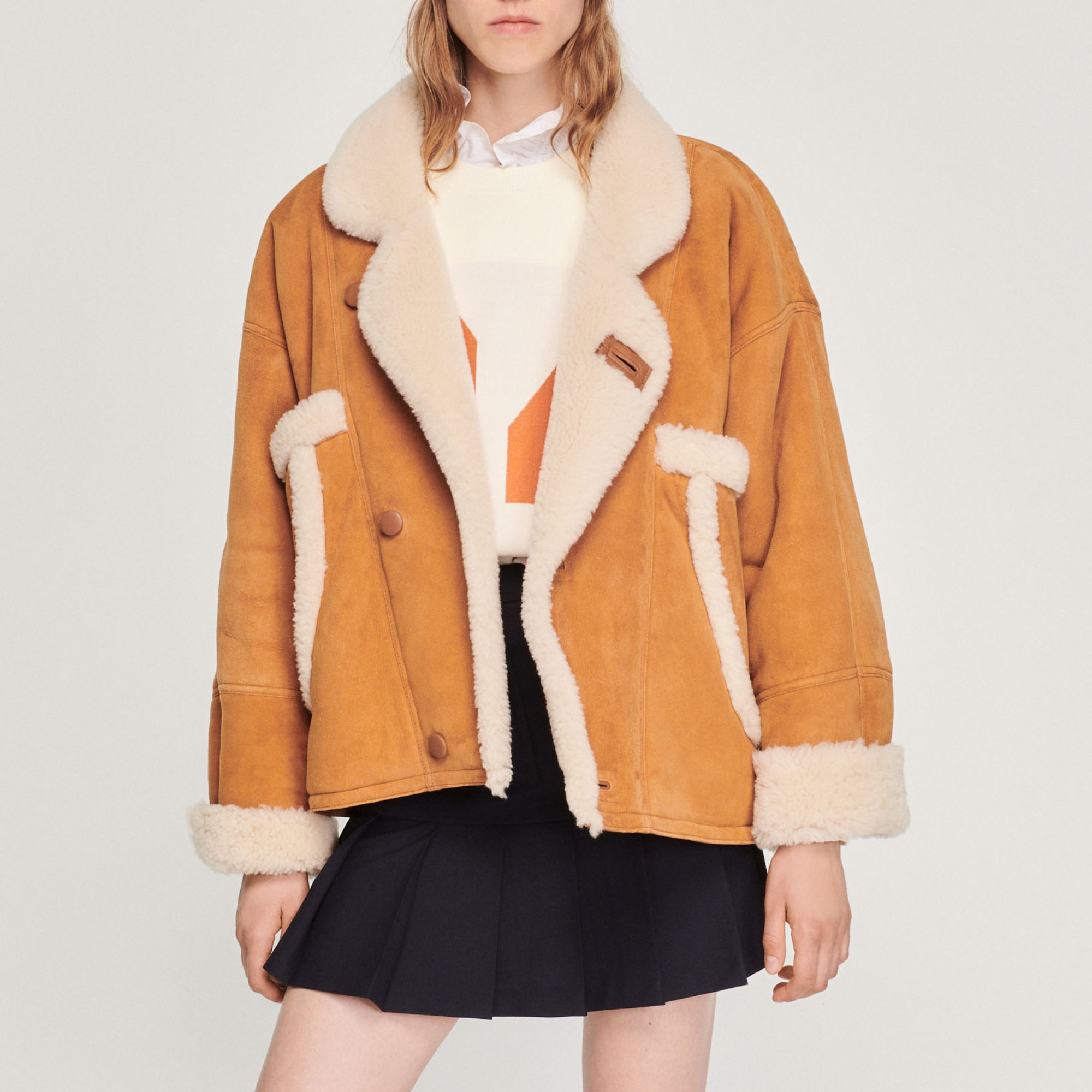 Short sheepskin coat - Coats | Sandro Paris